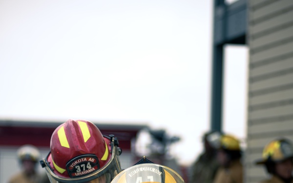 110th Wing Firefighters receive live building fire training during Japan DFT