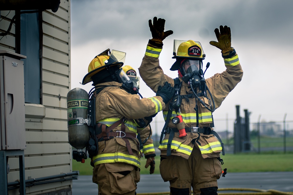 110th Wing Firefighters receive live building fire training during Japan DFT