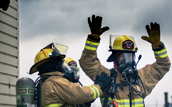 110th Wing Firefighters receive live building fire training during Japan DFT