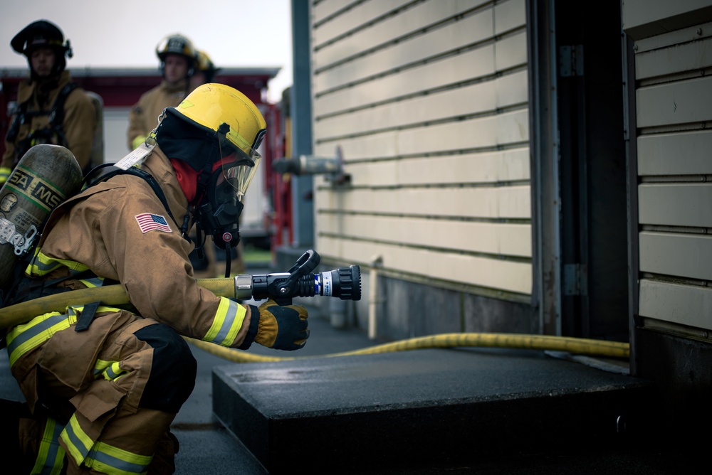 110th Wing Firefighters receive live building fire training during Japan DFT