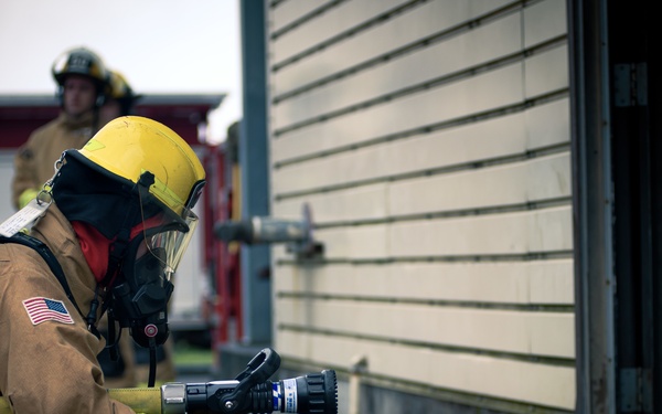 110th Wing Firefighters receive live building fire training during Japan DFT