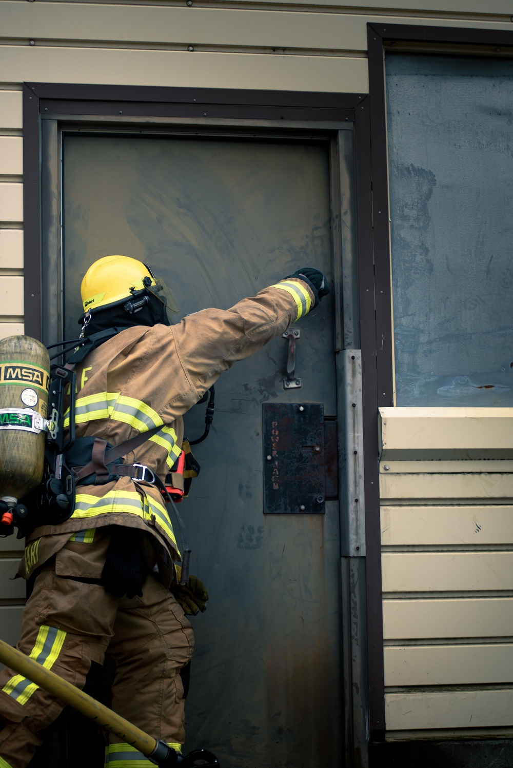 110th Wing Firefighters receive live building fire training during Japan DFT