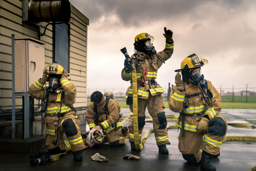 110th Wing Firefighters receive live building fire training during Japan DFT