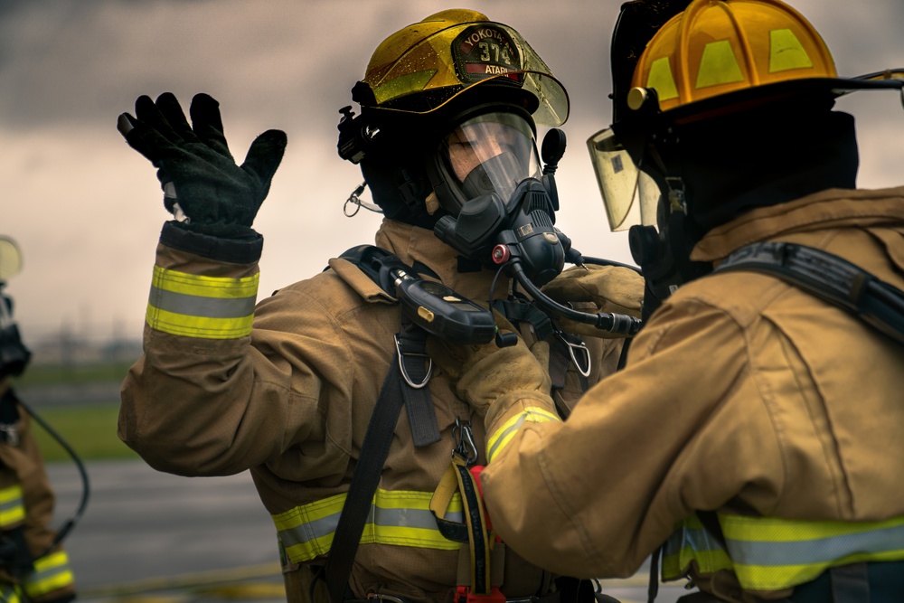 110th Wing Firefighters receive live building fire training during Japan DFT