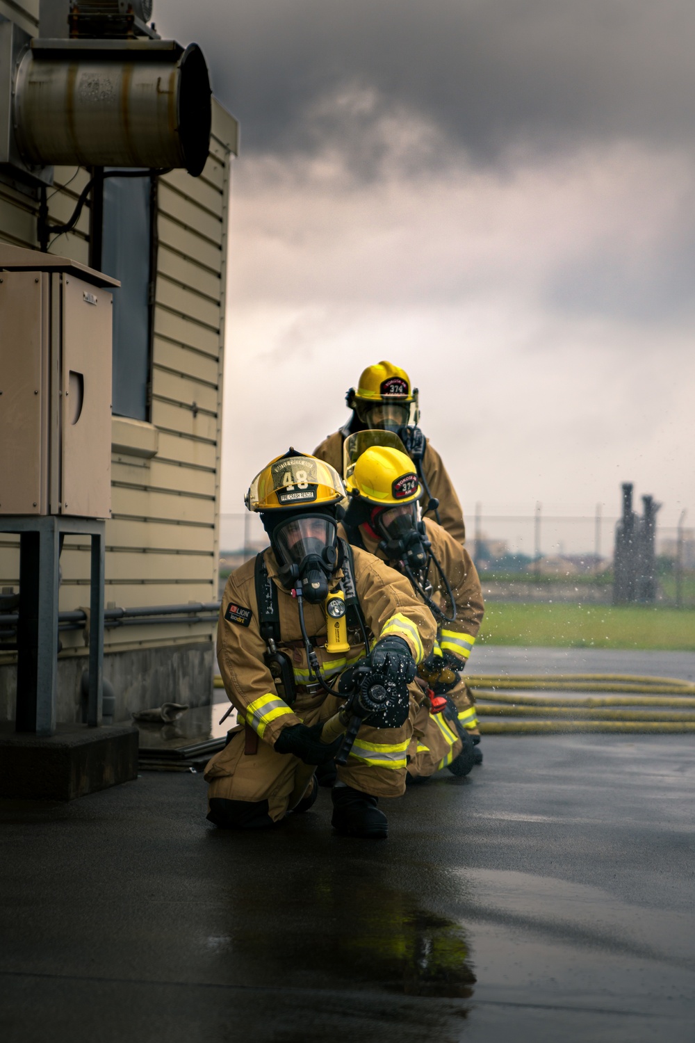 110th Wing Firefighters receive live building fire training during Japan DFT