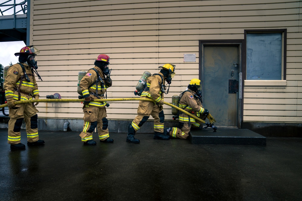 110th Wing Firefighters receive live building fire training during Japan DFT