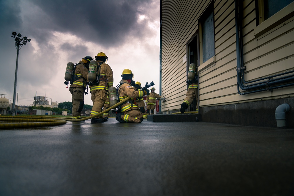 110th Wing Firefighters receive live building fire training during Japan DFT