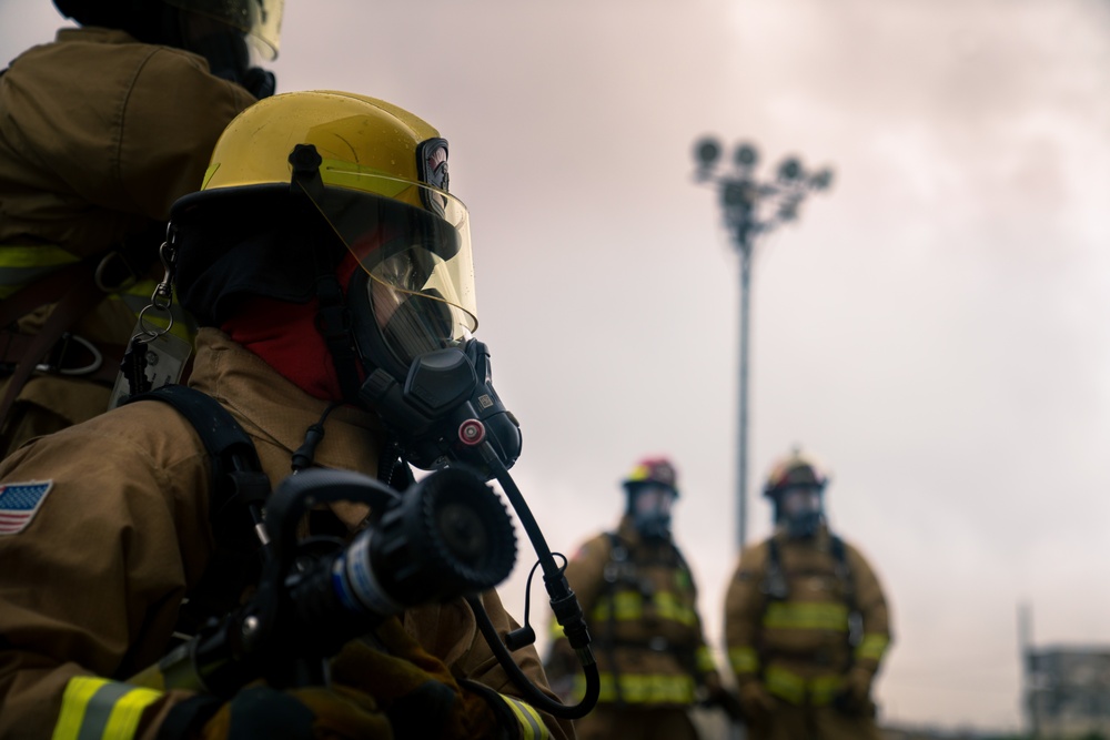 110th Wing Firefighters receive live building fire training during Japan DFT