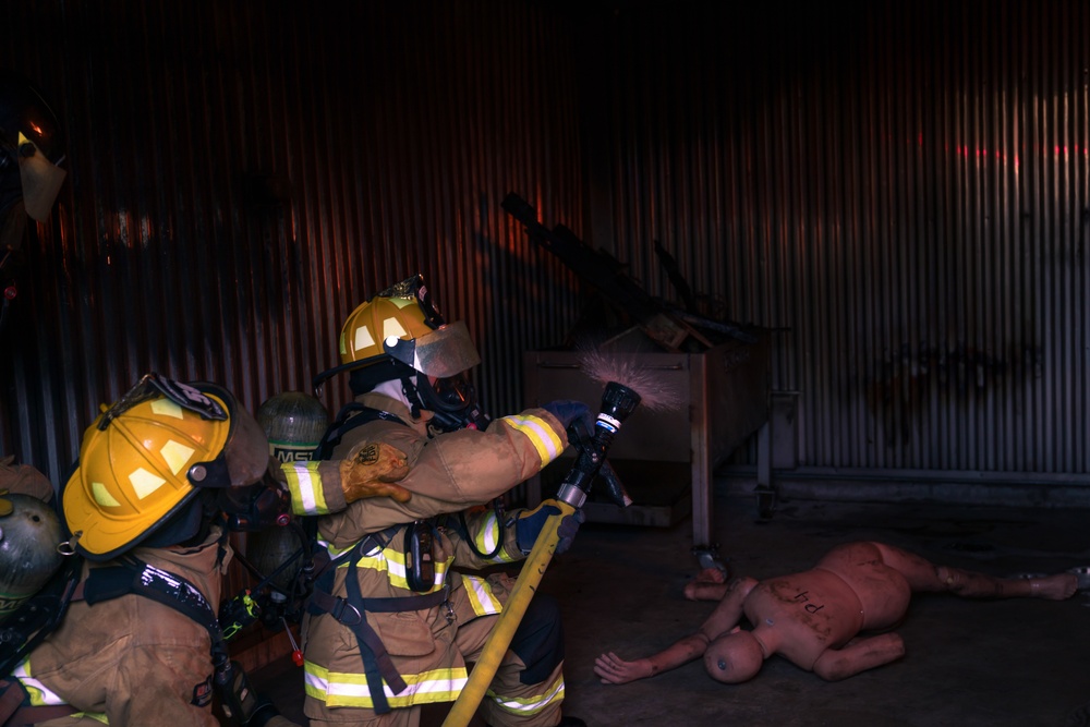 110th Wing Firefighters receive live building fire training during Japan DFT