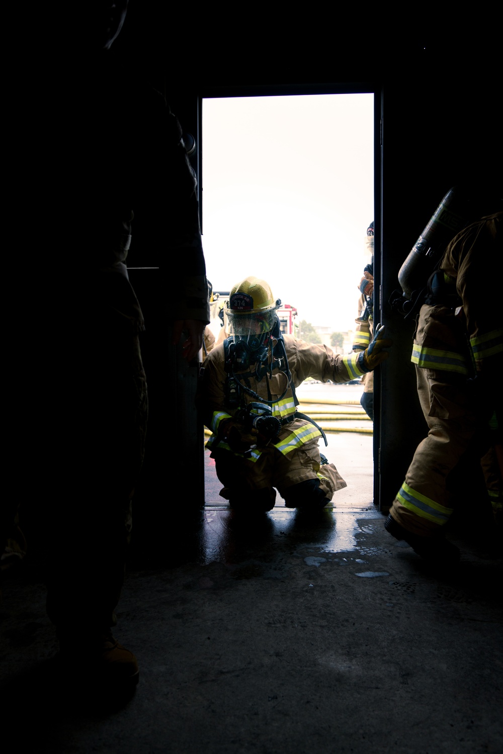 110th Wing Firefighters receive live building fire training during Japan DFT