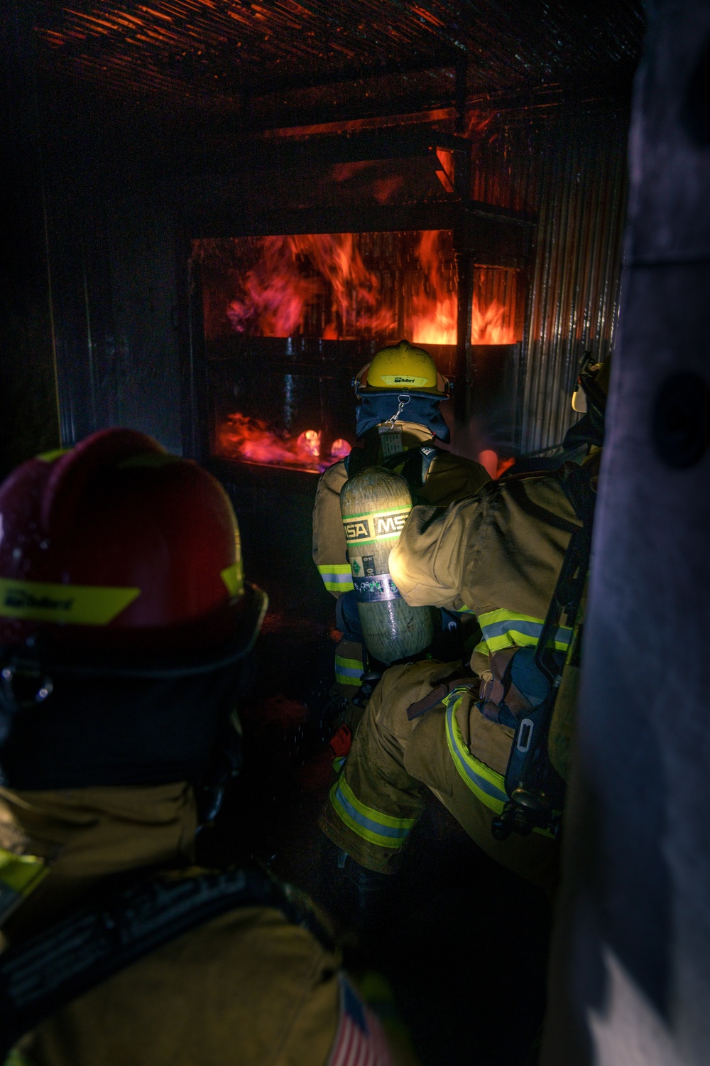 110th Wing Firefighters receive live building fire training during Japan DFT