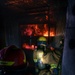 110th Wing Firefighters receive live building fire training during Japan DFT