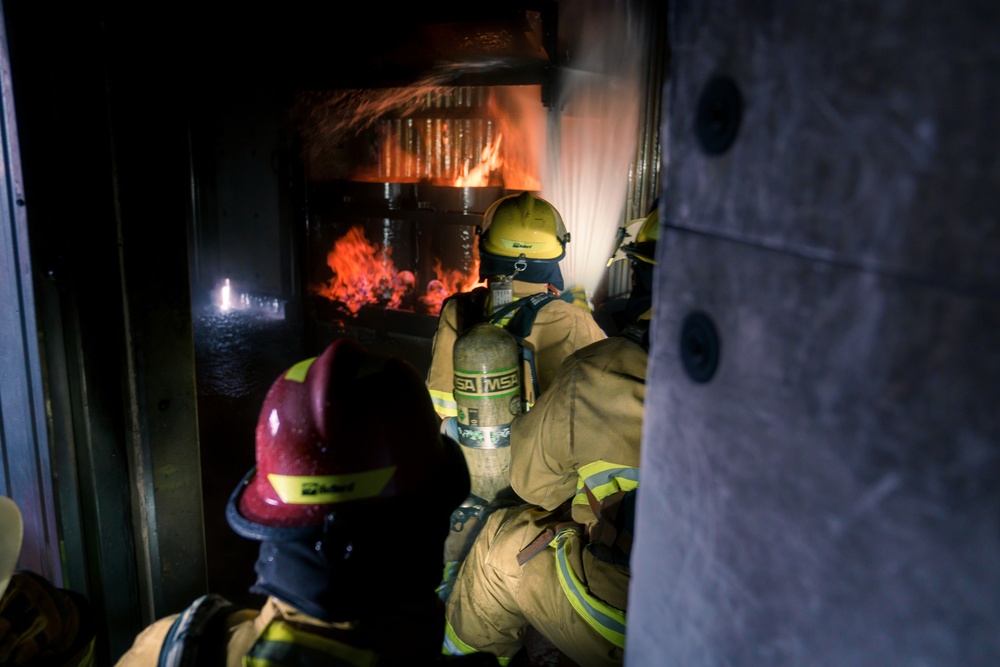 110th Wing Firefighters receive live building fire training during Japan DFT