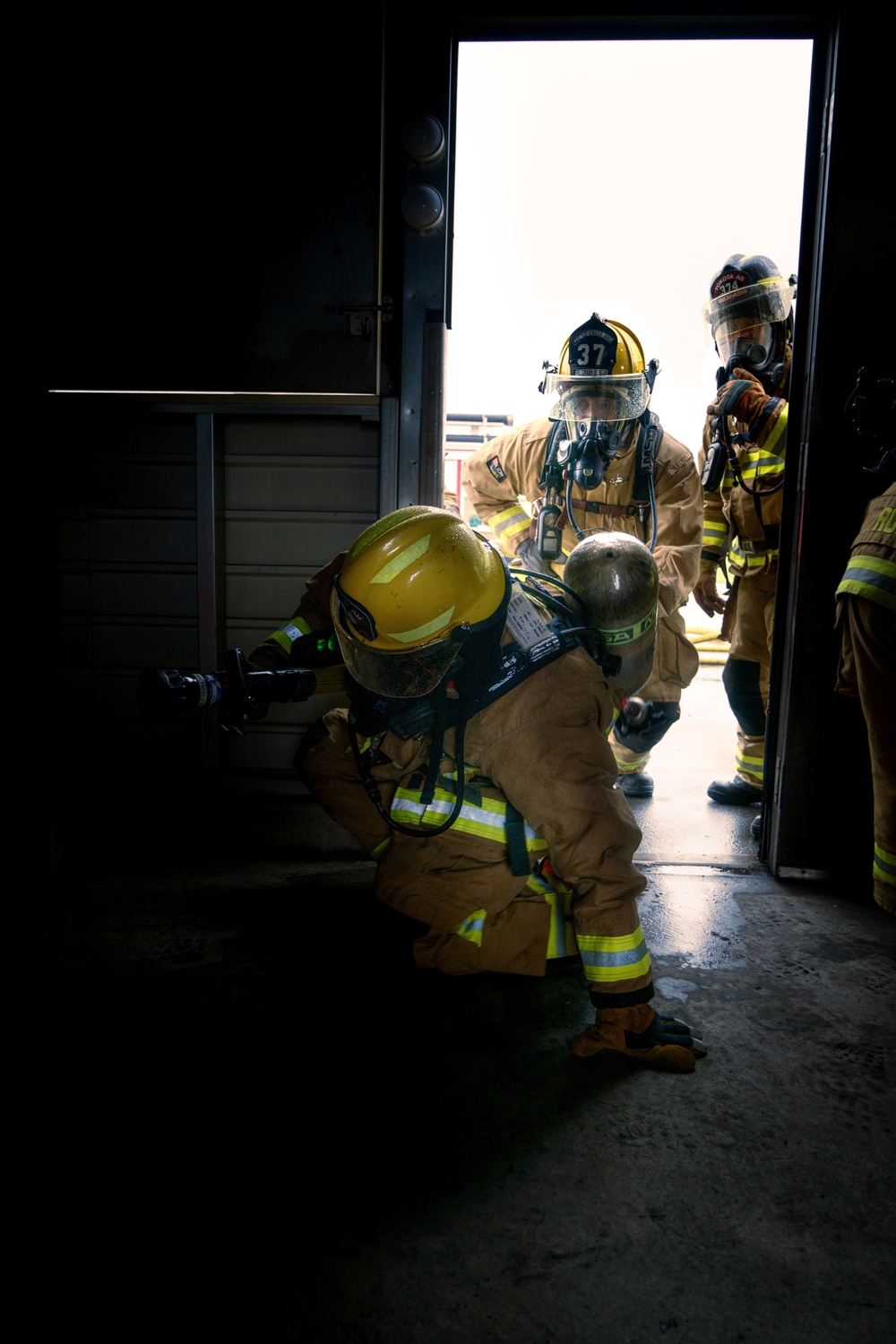 110th Wing Firefighters receive live building fire training during Japan DFT