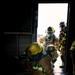 110th Wing Firefighters receive live building fire training during Japan DFT