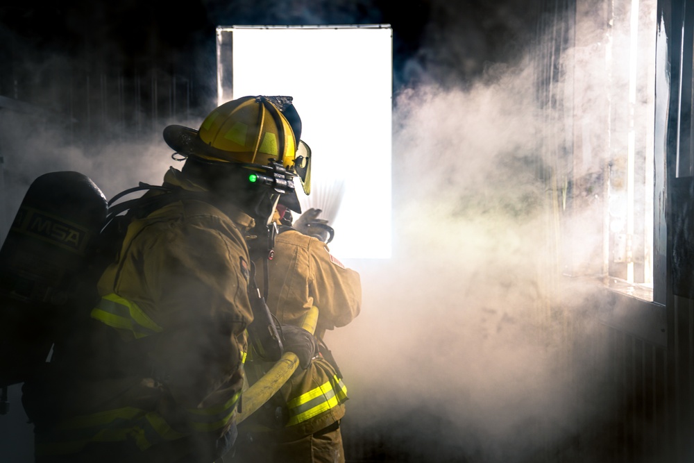 110th Wing Firefighters receive live building fire training during Japan DFT