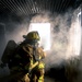 110th Wing Firefighters receive live building fire training during Japan DFT