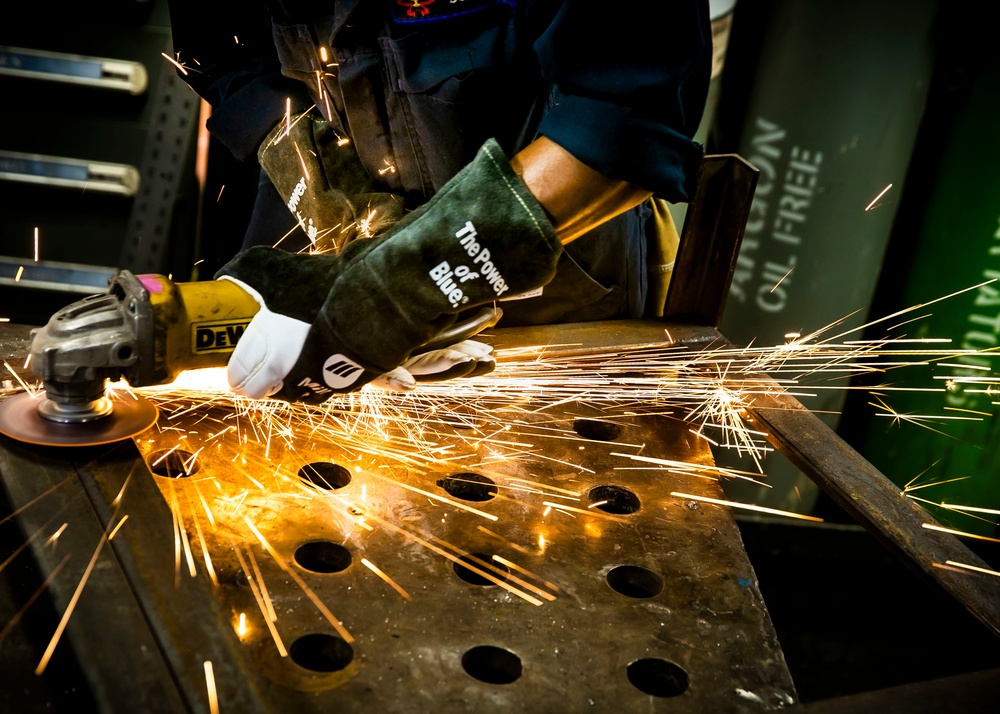 USS George H.W. Bush (CVN 77) Sailor Performs Maintenance