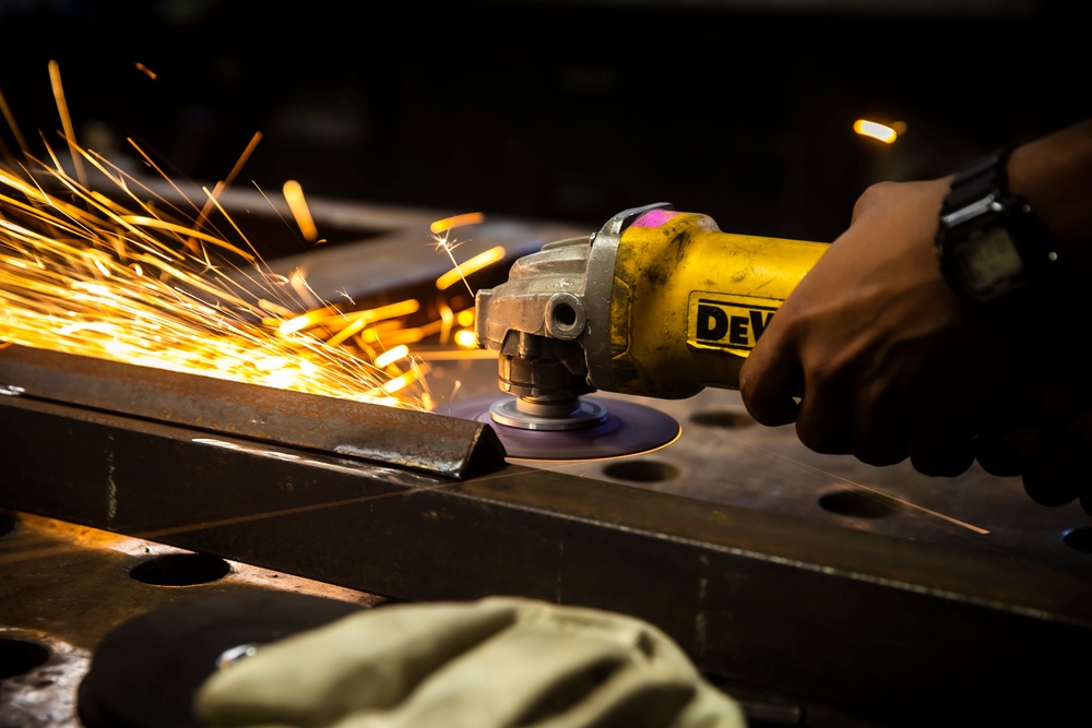 USS George H.W. Bush (CVN 77) Sailor Performs Maintenance