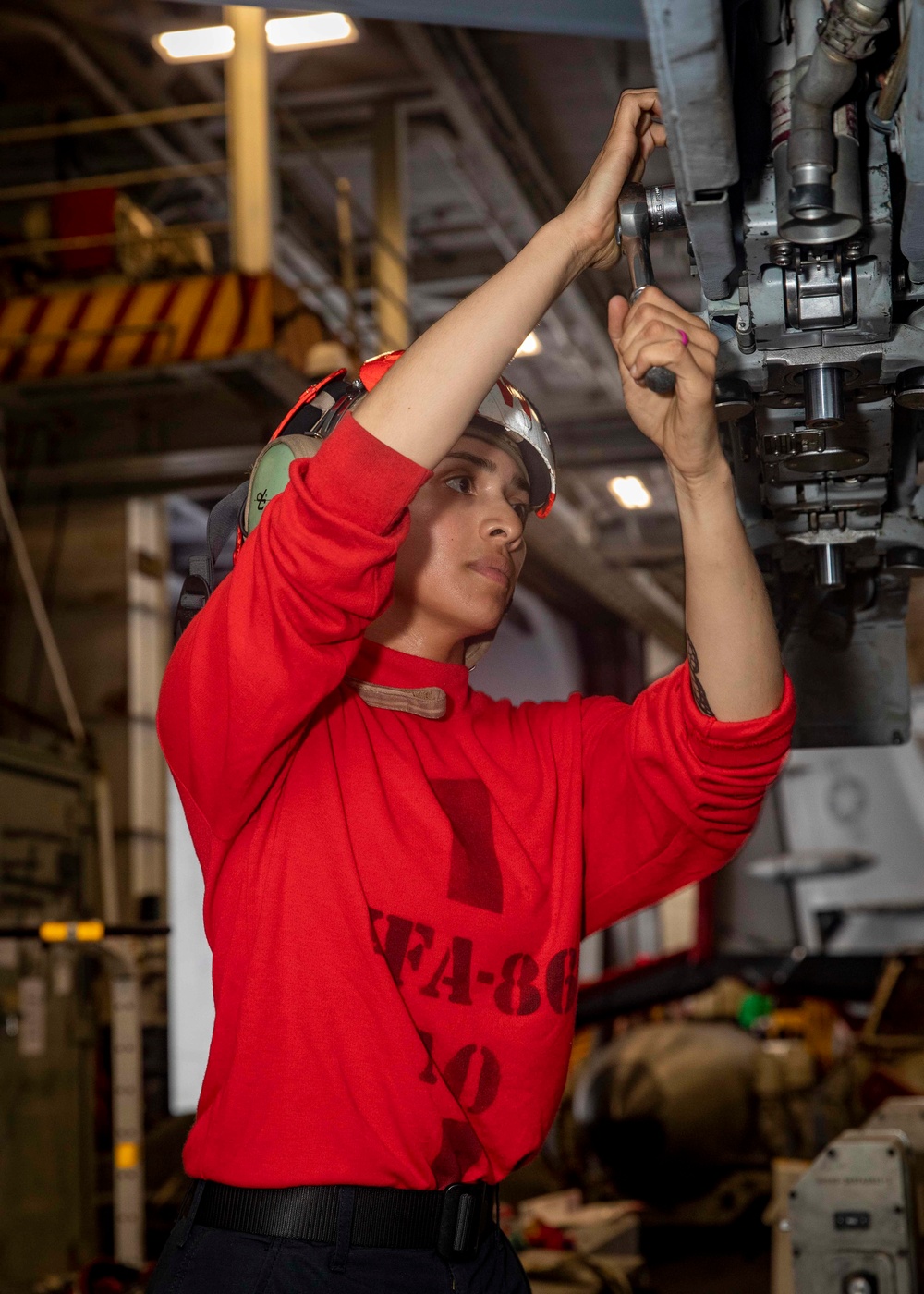 Strike Fight Squadron (VFA) 86 Sailor Performs Maintenance Aboard USS George H.W. Bush (CVN 77)