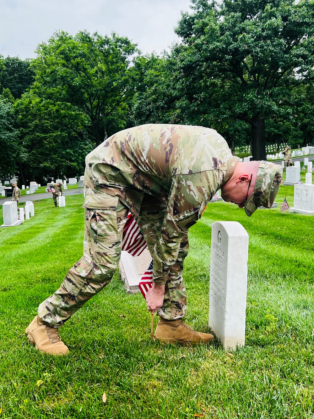 DVIDS - Images - DHA Staff Chaplain Major Garnett placing flags at ...