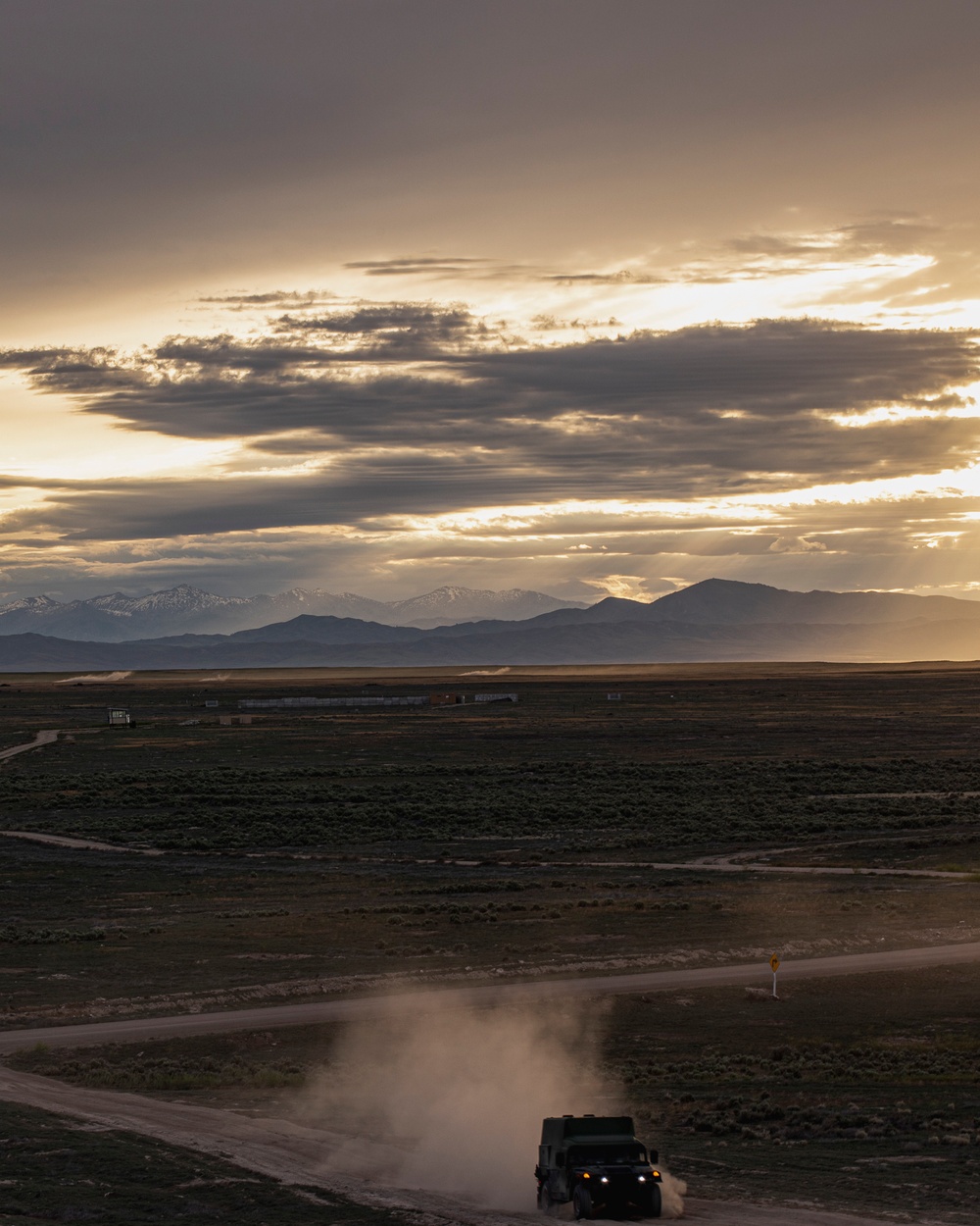 Dust from impact flies during Western Strike 22