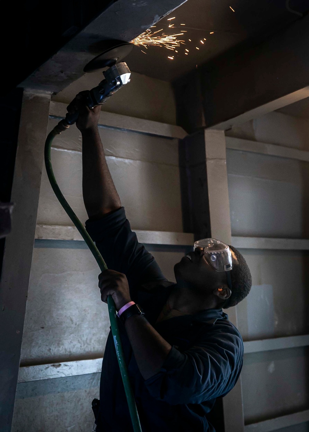 USS George H.W. Bush (CVN 77) Sailor Performs Maintenance