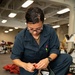 USS George H.W. Bush (CVN 77) Sailor Performs Maintenance