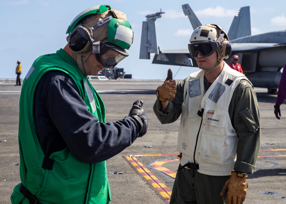 USS George H.W. Bush (CVN 77) Executive Officer Speaks with Sailor