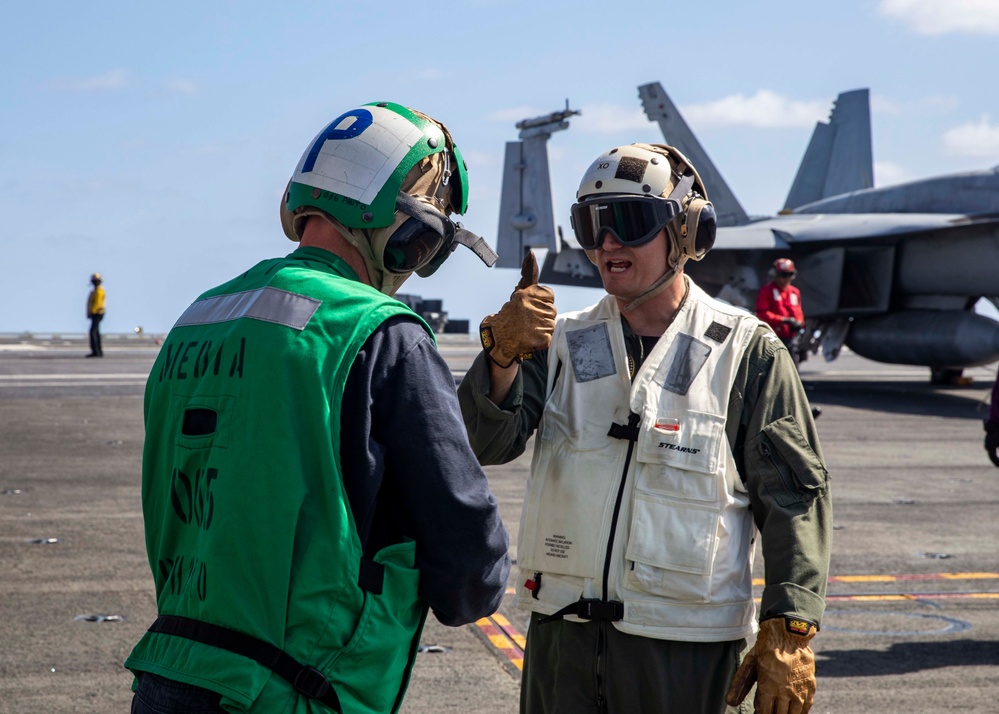 USS George H.W. Bush (CVN 77) Executive Officer Speaks with Sailor