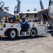 USS George H.W. Bush (CVN 77) Sailor Tows Aircraft