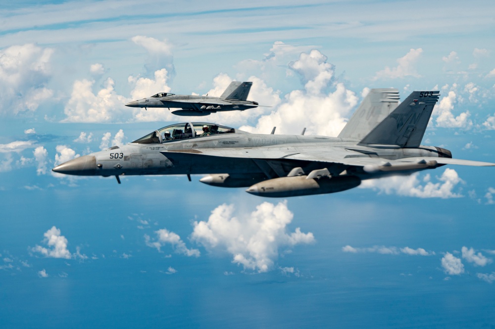 Carrier Air Wing 5 Aircraft Refuel with 506th Expeditionary Air Refueling Squadron