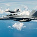 Carrier Air Wing 5 Aircraft Refuel with 506th Expeditionary Air Refueling Squadron