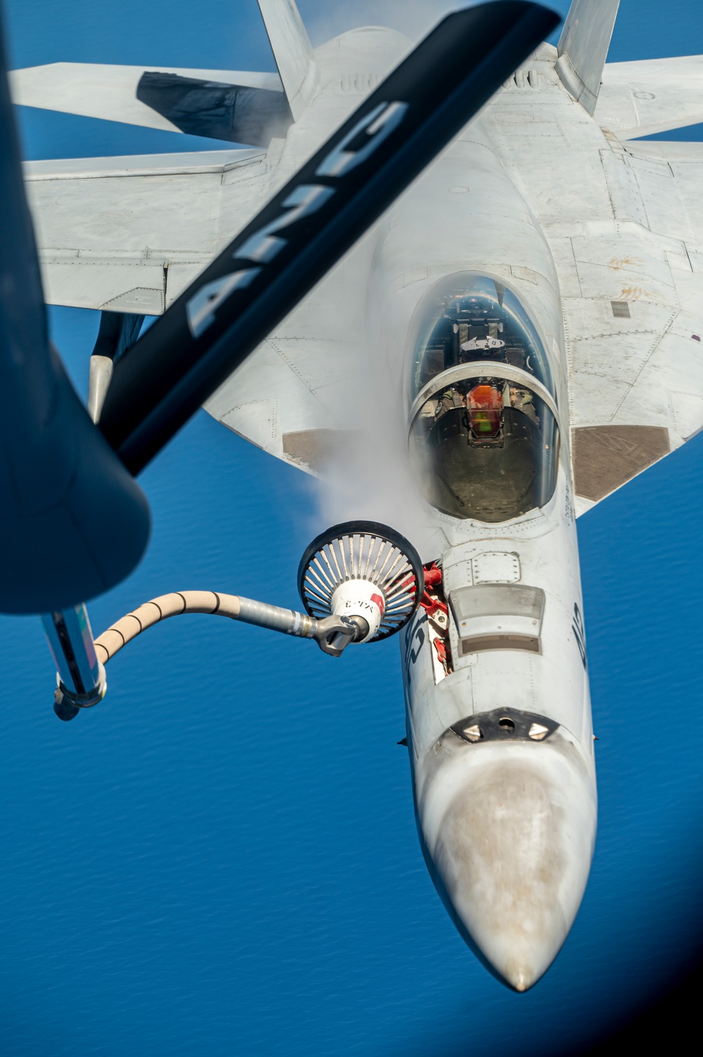 Carrier Air Wing 5 Aircraft Refuel with 506th Expeditionary Air Refueling Squadron