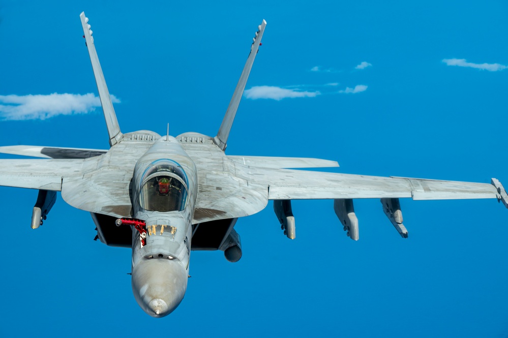 Carrier Air Wing 5 Aircraft Refuel with 506th Expeditionary Air Refueling Squadron