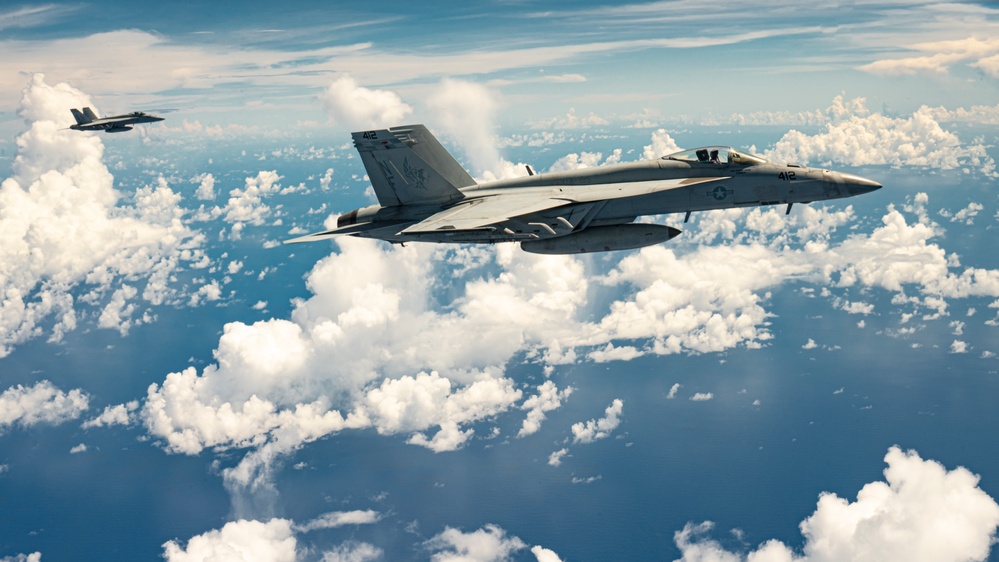 Carrier Air Wing 5 Aircraft Refuel with 506th Expeditionary Air Refueling Squadron