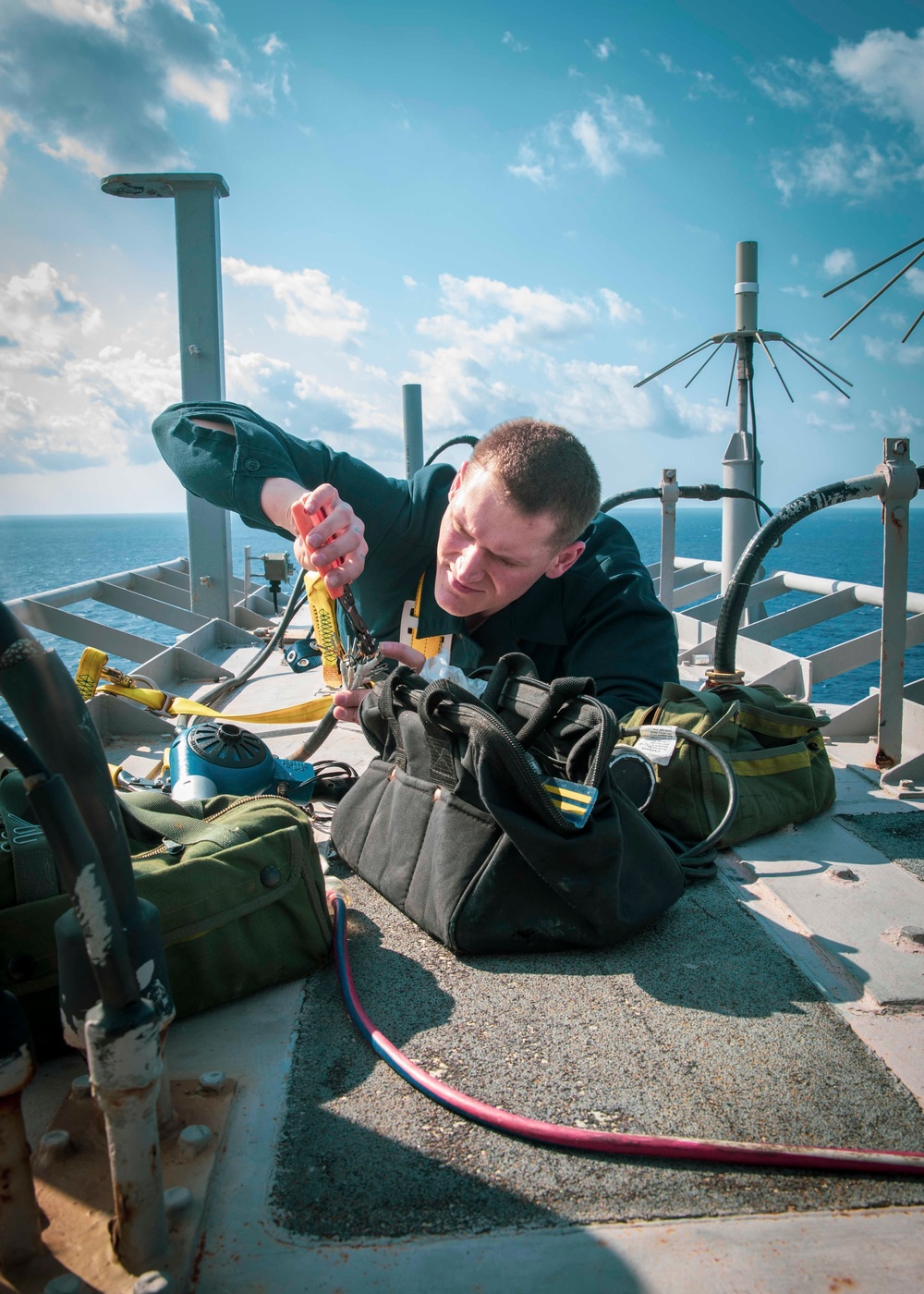 USS George H.W. Bush (CVN 77) Sailor Conducts Maintenance