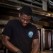 USS George H.W. Bush (CVN 77) Culinary Specialist Prepares Food for the Crew