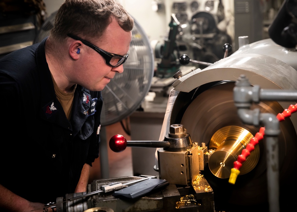 USS George H.W. Bush (CVN 77) Sailor Performs Maintenance