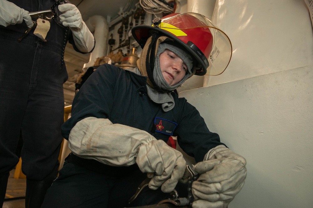 USS George H.W. Bush (CVN 77) Sailor Participates in Flooding Drill