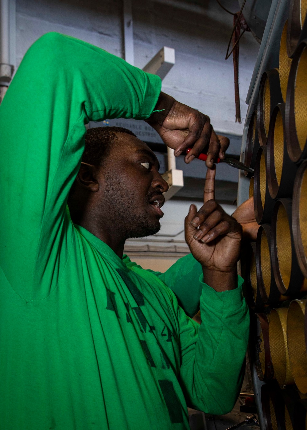 Helicopter Maritime Strike Squadron (HSM) 46 Sailor Conducts Maintenance Aboard USS George H.W. Bush (CVN 77)