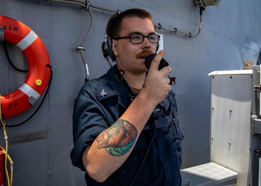 USS George H.W. Bush (CVN 77) Sailor Stands Watch