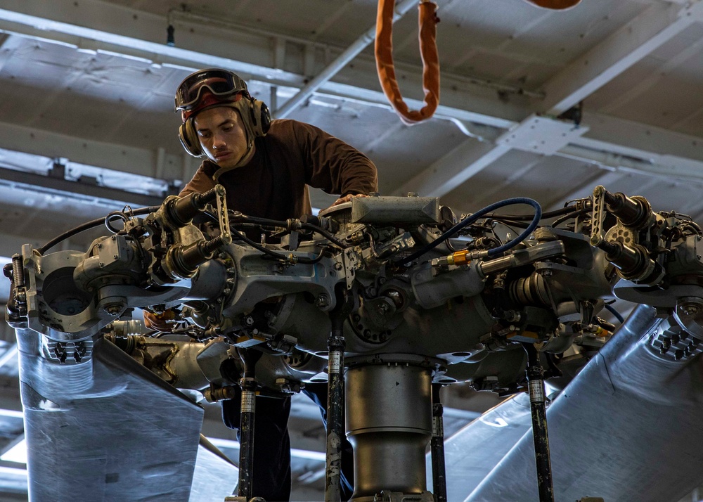 Helicopter Maritime Strike Squadron (HSM) 46 Sailor Conducts Maintenance Aboard USS George H.W. Bush (CVN 77)