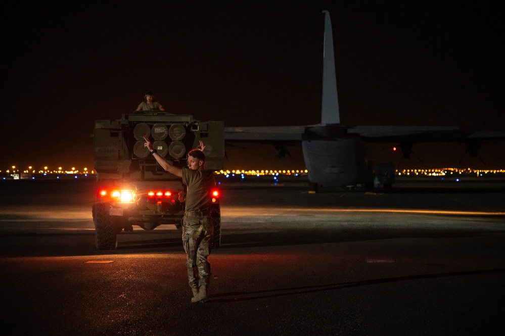 386th Air Expeditionary Wing loads HIMARS onto C-130J Super Hercules