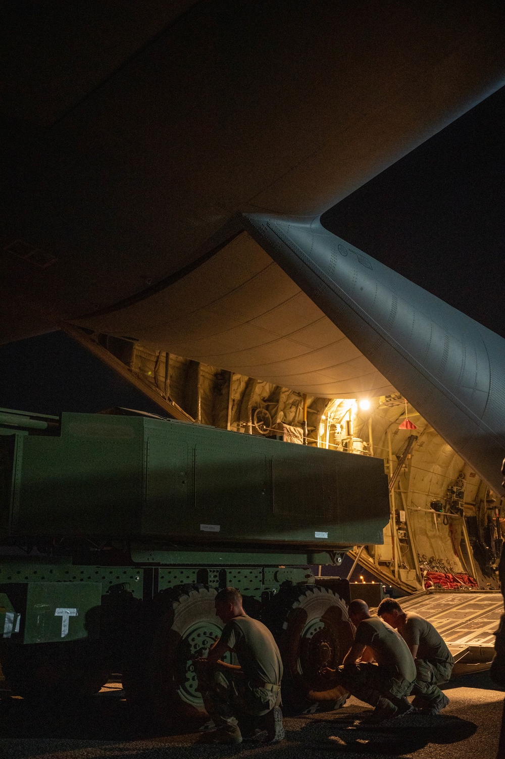 386th Air Expeditionary Wing loads HIMARS onto C-130J Super Hercules