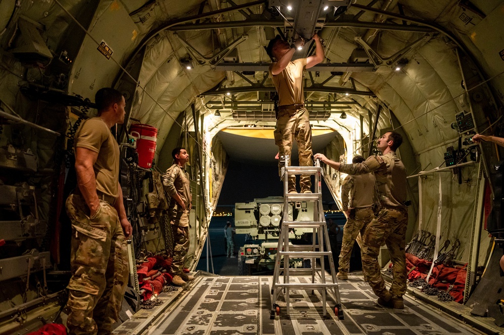 386th Air Expeditionary Wing loads HIMARS onto C-130J Super Hercules