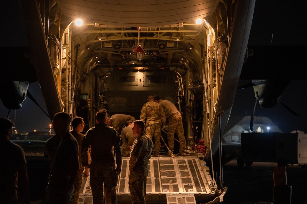 386th Air Expeditionary Wing loads HIMARS onto C-130J Super Hercules