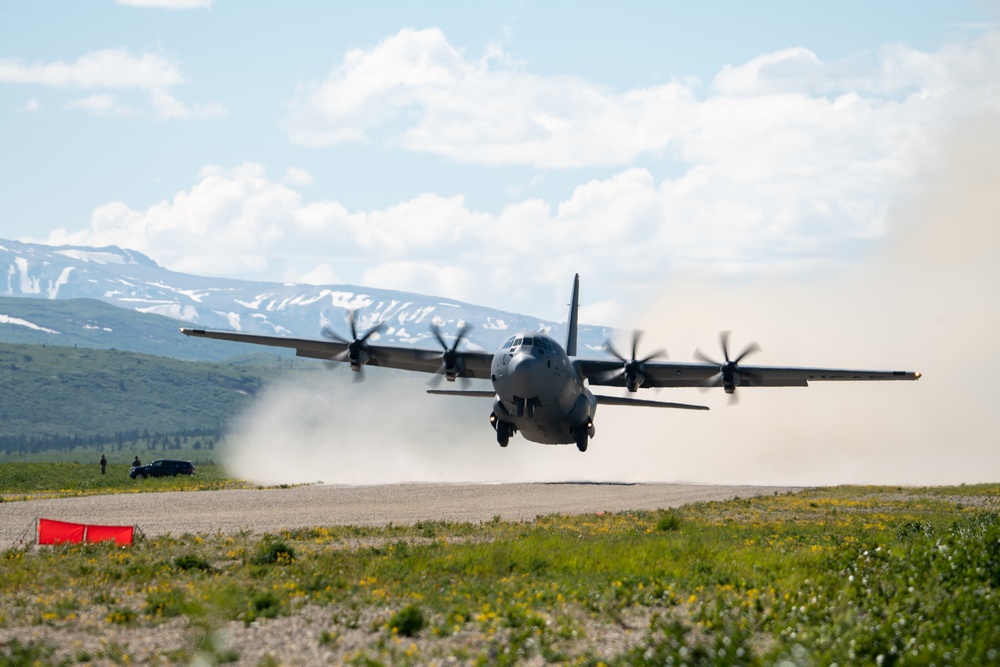 C-130s weave through mountains, perform dirt strip landings for RED FLAG 22-2