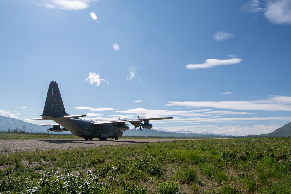 C-130s weave through mountains, perform dirt strip landings for RED FLAG 22-2