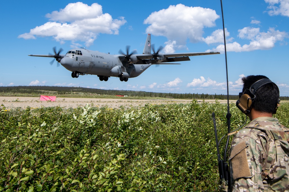 C-130s weave through mountains, perform dirt strip landings for RED FLAG 22-2